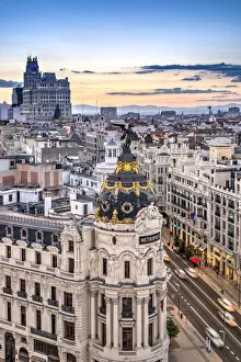 Images Dated 26th August 2021: Gran Via and city skyline at sunset, Madrid, Community of Madrid, Spain
