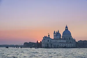 the Grand Canal at sunset with Basilica of Saint Mary of Health, Punta della Dogana