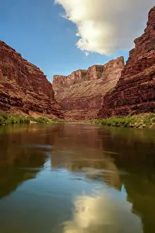 Flowing Water Prints: Grand Canyon cliff reflections in the Colorado River at daybreak (Georgie's Camp Mile 20)