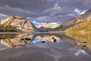 Granite mountains reflected in Tenaya Lake, Yosemite National Park, California, USA