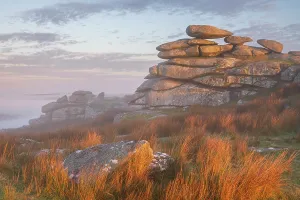 Stowes Hill Prints: Granite Tor on Stowe's Hill at dawn on a misty morning