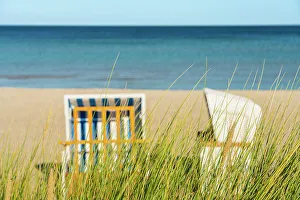 Beach Chair Prints: Grass with beach chairs on beach in background