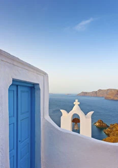 Church Tower Gallery: Greece, The Cyclades, Santorini (Thira), Oia, Blue door and bell tower