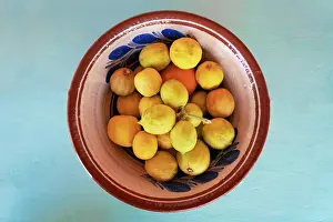 Aegean Prints: Greece, Dodecanese, Kos Island, Zia, Bowl of lemons on blue table