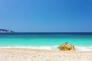 Images Dated 17th August 2022: Greece, Iionian Islands, Kefalonia. Aspros Gialos beach on the west coast of Kefalonia is one of