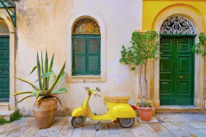 Kerkyra Prints: Greece, Ionian Islands, Corfu, Corfu town, yellow Vespa scooter