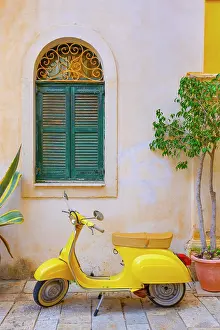 Kerkyra Prints: Greece, Ionian Islands, Corfu, Corfu town, yellow Vespa scooter