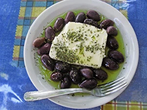 Images Dated 14th December 2010: Greek Feta Cheese and Olives in Oil, sprinkled with a lttle Oregano