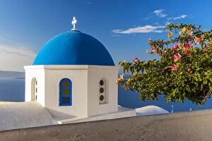 Greek orthodox church with blue dome, Oia, Santorini, South Aegean, Greece
