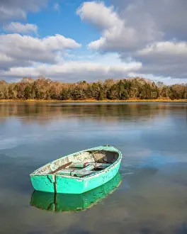 Salt Pond Prints: Green rowboat on ice at Salt Pond, Cape Cod, Eastham, Massachusetts, USA