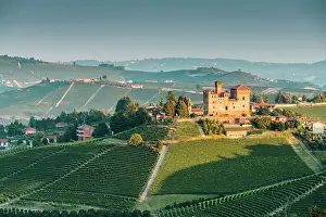 Vine Prints: Grinzane Cavour village at sunrise. Langhe region, Cuneo province, Piedmont, Italy