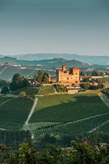 Vine Prints: Grinzane Cavour village at sunrise. Langhe region, Cuneo province, Piedmont, Italy