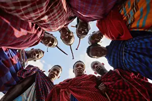 Clothing Prints: A group of Msai wearing traditional shukas'in a village near Arusha