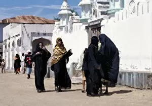 Mosques Gallery: A group of Swahili women clad in black to signify their