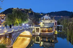Canal Prints: Gubei Water Town with the Great Wall of China at Simatai (UNESCO World Heritage Site) in the background at dusk