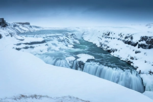 Cloudy Prints: Gullfoss waterfalls in winter at sunrise
