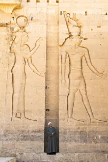 Guradian at the Temple of Philae on an island in Lake Nasser, Nile River, Aswan, Egypt