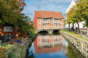 Images Dated 3rd January 2023: Half-timbered building called Gewolbe (The Vault) and Muhlenbach river, Wismar, UNESCO