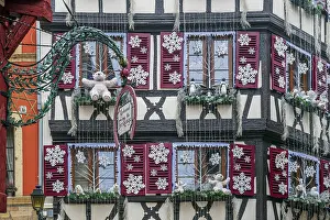 Grand Est Prints: Half-timbered house adorned with Christmas decorations in the old town