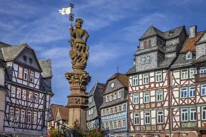 Half-timbered houses and fountains at Katharinenmarkt in Butzbach, Wetterau, Hesse