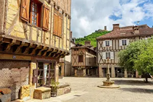 Half Timbered Prints: Half-timbered medieval houses, Mercadial Square, Saint Cere, Lot, Occitanie, France