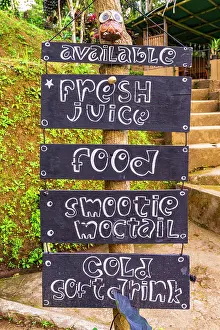 Tropical Climate Prints: Handwritten wooden signs outside a cocktail bar in the jungle, Bali, Indonesia