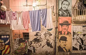 Street Art Prints: Hanging clothing and murals of Neapolitans celebrities in the Spanish Neighborhood