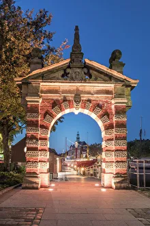 Nordsee Prints: Harbor gate with a view of the Ratsdelft with town hall at blue hour