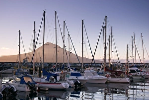 Harbour with volcanic island of Pico beyond