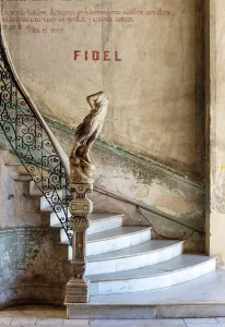 Fidel Prints: Headless statue and staircase at the entrance to La Guarida