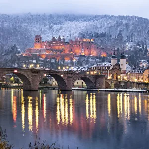 Heidelberg castle and Old Bridge illuminated in winter, Baden-Wurttemberg, Germany