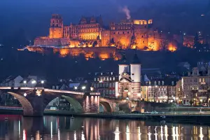 Heidelberg castle and Old Bridge illuminated in winter at night, Baden-Wurttemberg