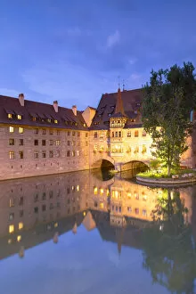 Images Dated 11th October 2018: Heilig-Geist Spital on River Pegnitz at dusk, Nuremberg, Bavaria, Germany