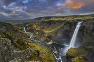 Hifoss waterfall at midnightsun during summer, Fossa river, Iceland