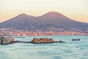 High angle view of Castel Dell'Ovo fortress and Vesuvius at sunset, Belvedere di Sant'Antonio a Posillipo, Naples, Italy