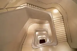 Staircase Prints: High angle view of spiral staircase inside CaixaForum in Paseo del Prado, Madrid, Spain