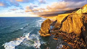 Natural Park Prints: High angle view of waves crashing on Roque Del Moro rock tower, Cofete beach, Jandia