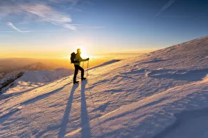 Snowy Gallery: Hiker in Brescia prealpi at dawn, Monte Guglielmo, Brescia provinc, Lombardy District