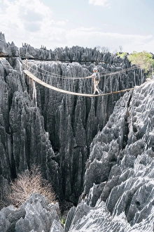 Hiking Trail Prints: Hiker crosses a rope bridge. Madagascar, Africa. Tsingy De Bemaraha