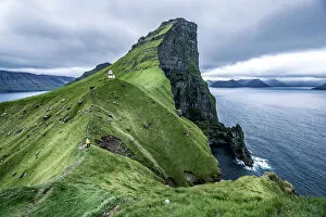 Images Dated 14th July 2018: Hiker near the Kalsoy Lighthouse, Faroe Islands, Europe