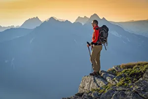 Tirol Prints: Hiker in Peterskopfl at sunrise Europe, Austria, Zillertal, Peterskopfl, Keisergebirge