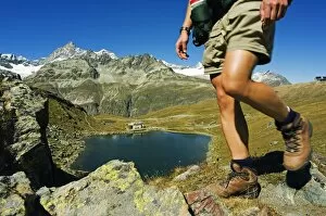 Images Dated 4th September 2006: Hiker on trail above lake at Schwarzee Paradise (MR)