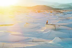 High Key Prints: Hiker watching sunrise, Campo de Piedra Pomez, El Penon, Catamarca, Argentina. (MR)