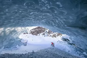 Images Dated 24th March 2021: Hikers inside the ice cave in Val Roseg, Pontresina, Canton of GraubAonden, Engadine