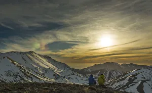 Contrast Prints: Hikers looking at the sunset in Lefka Ori mountain range, Crete, Greece