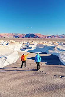 Males Prints: Hikers observing white rocks at Campo de Piedra Pomez