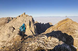 Trekker Prints: Hiking in Latemar mount during summer in DOlomites mountains