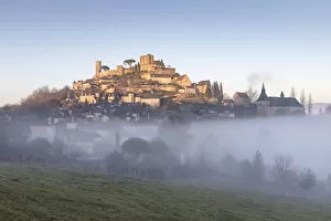 Images Dated 22nd December 2017: Hilltop village of Turenne surrounded by mist, Correze; Nouvelle-Aquitaine; France