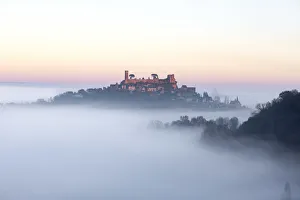 Images Dated 22nd December 2017: Hilltop village of Turenne surrounded by mist, Correze; Nouvelle-Aquitaine; France