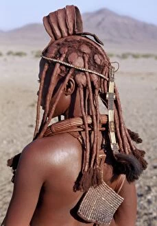 A Himba woman in traditional attire